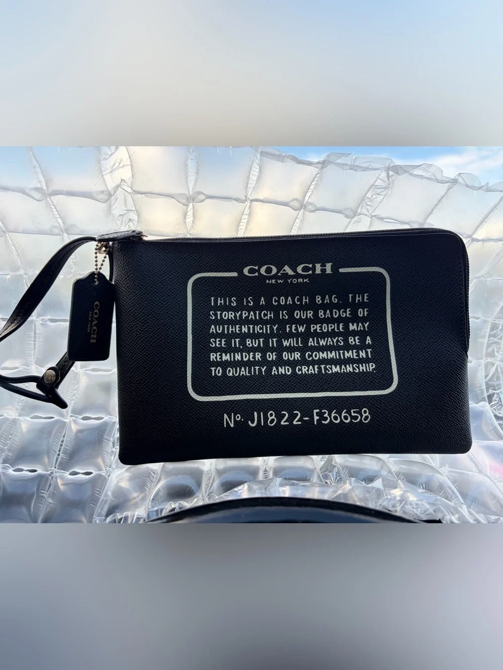 Coach Black Leather Wristlet Pouch with White story patch
